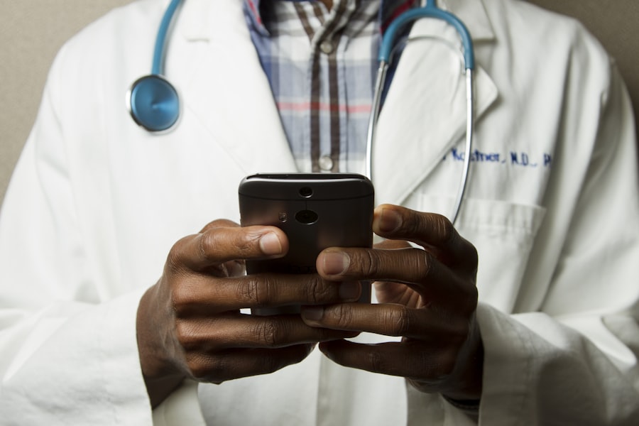Doctor with a stethoscope reviewing a checklist on a phone
